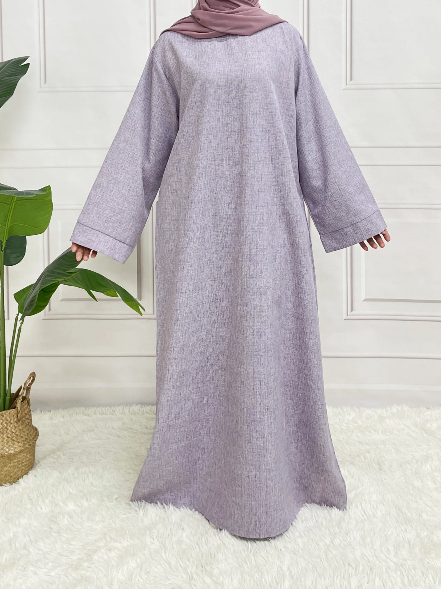 Stylish Modest Closed Abaya featuring long sleeves and a belt, ideal for layering and enhancing your modest wardrobe.