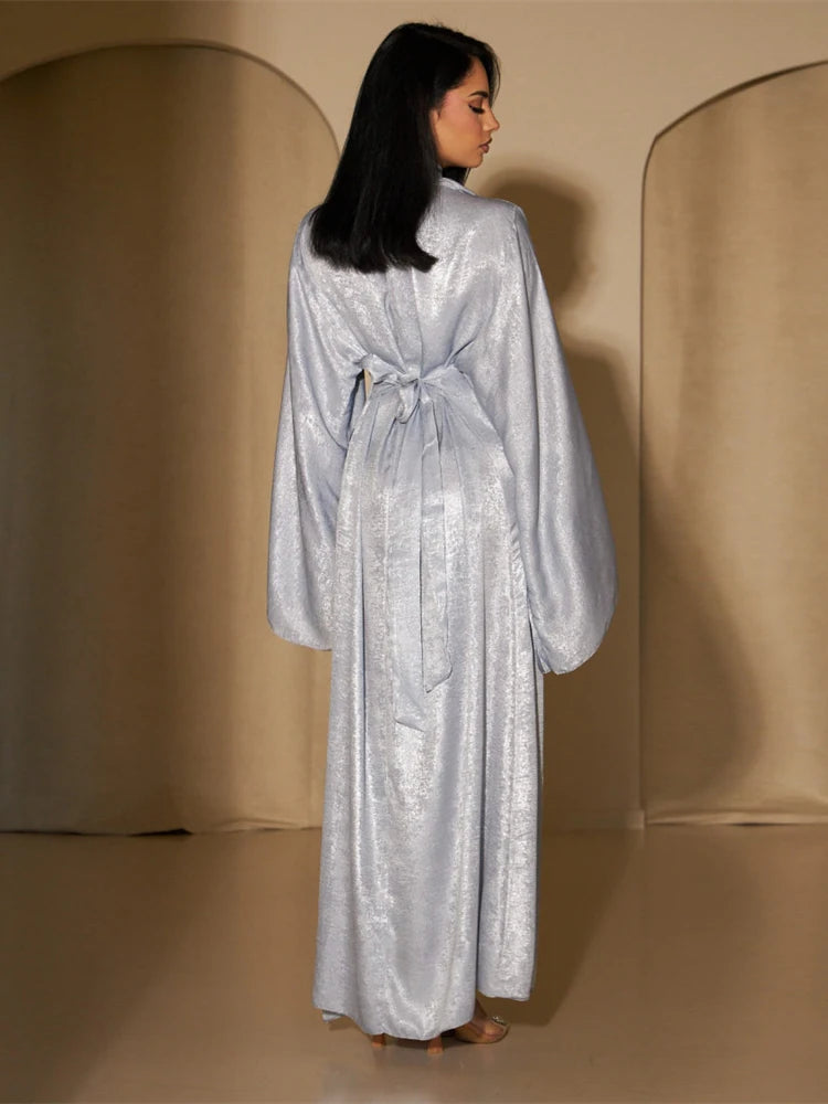 Chic Shiny Satin Abaya for women, perfect for special occasions, offering a sophisticated and comfortable fit.