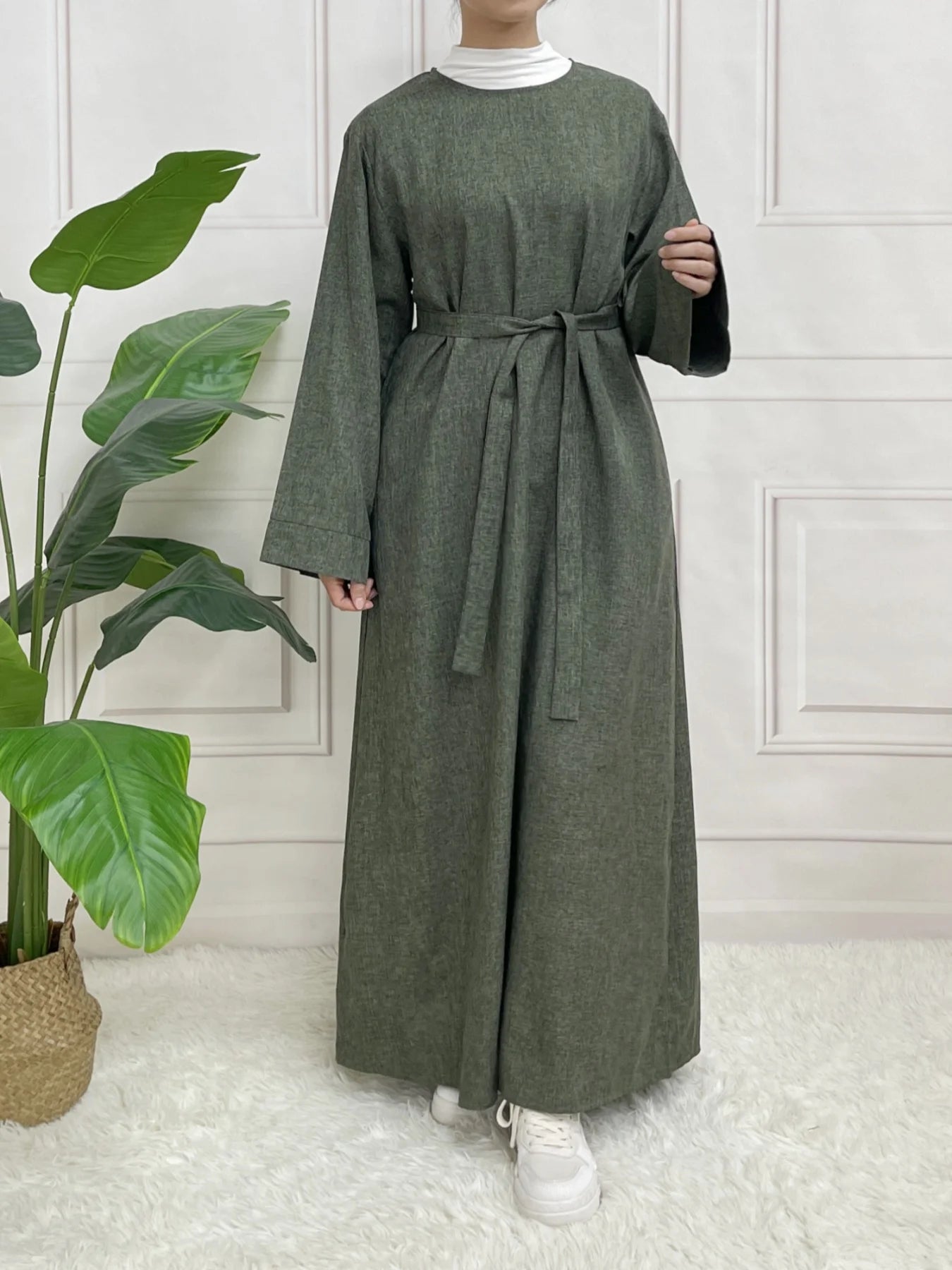 Versatile Closed Abaya with long sleeves and a belt, perfect for everyday wear and special occasions in modest style.