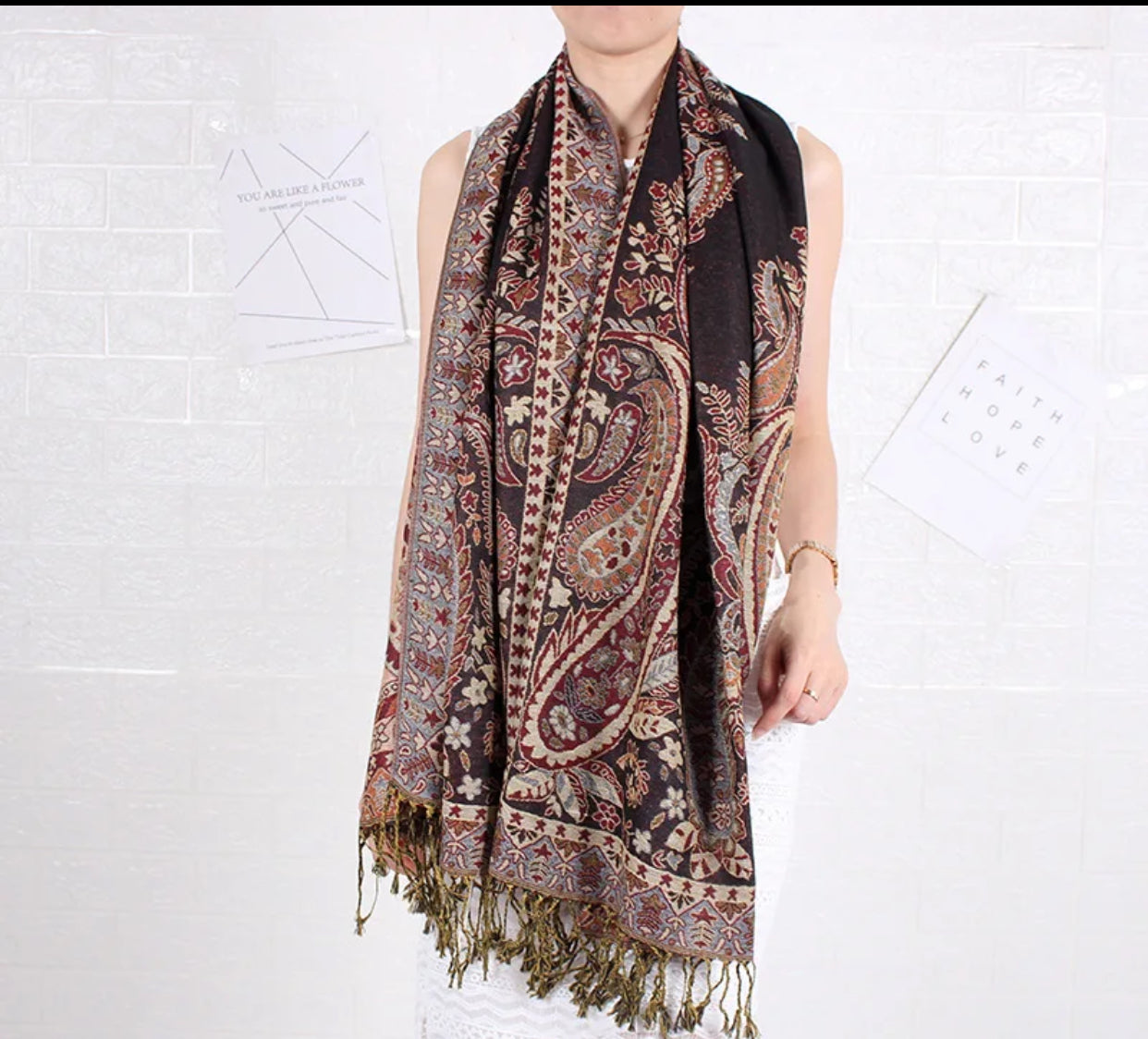 Versatile shawls in various colors and patterns, perfect for adding a touch of style to casual and formal wear.